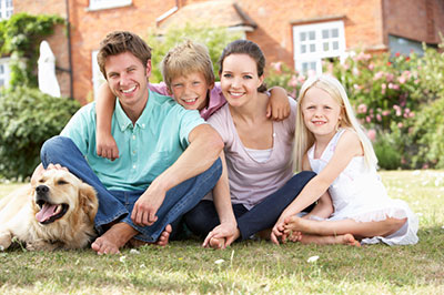 image of family sitting in yard
